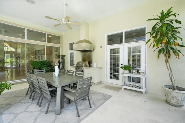 19 Tomoka Cove Way, Ormond Beach, FL 32174 - view of patio / terrace featuring exterior kitchen, a ceiling fan, outdoor dining space, and french doors