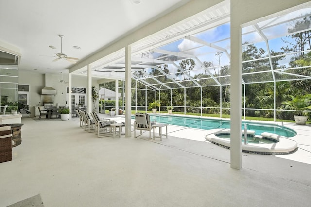 19 Tomoka Cove Way, Ormond Beach, FL 32174 - view of swimming pool featuring a patio area, ceiling fan, a pool with connected hot tub, and glass enclosure
