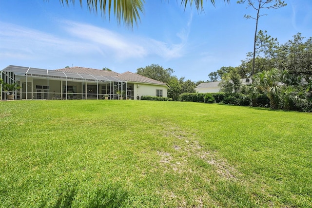 19 Tomoka Cove Way, Ormond Beach, FL 32174 - view of grassy yard featuring glass enclosure