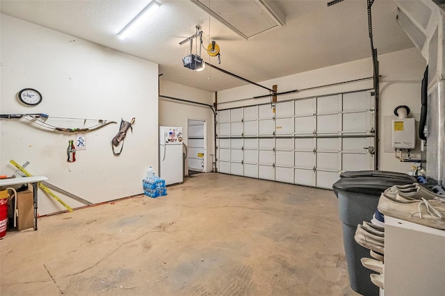 19 Tomoka Cove Way, Ormond Beach, FL 32174 - garage featuring freestanding refrigerator and a garage door opener