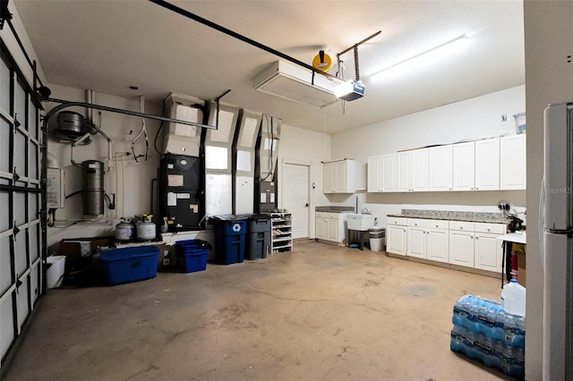 19 Tomoka Cove Way, Ormond Beach, FL 32174 - garage with a garage door opener