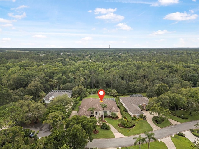 19 Tomoka Cove Way, Ormond Beach, FL 32174 - view of property location with a heavily wooded area