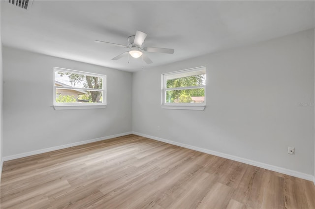 173 Cedar Ave, Orange City, FL 32763 - unfurnished room with light wood-style floors and ceiling fan