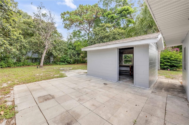 173 Cedar Ave, Orange City, FL 32763 - view of patio featuring an outbuilding