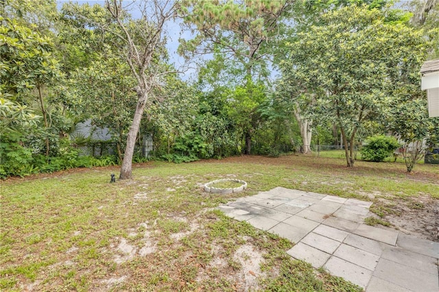 173 Cedar Ave, Orange City, FL 32763 - view of yard with a patio and an outdoor fire pit