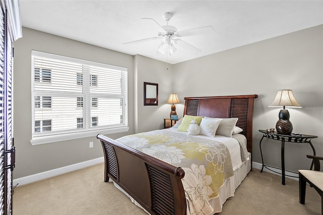3315 S Atlantic Ave Unit 1605, Daytona Beach Shores, FL 32118 - bedroom with light carpet and a ceiling fan