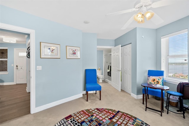 3315 S Atlantic Ave Unit 1605, Daytona Beach Shores, FL 32118 - sitting room with light colored carpet and ceiling fan