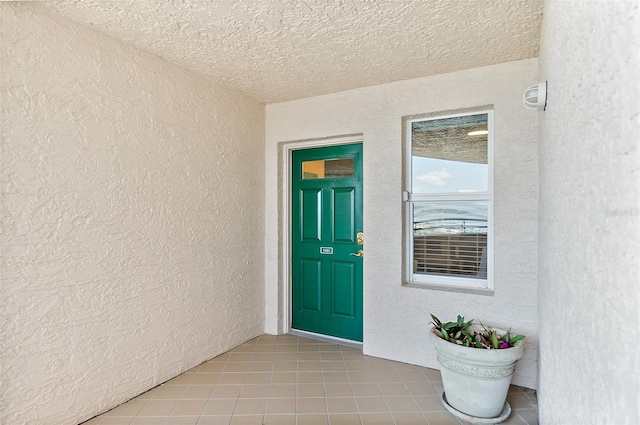 3315 S Atlantic Ave Unit 1605, Daytona Beach Shores, FL 32118 - view of exterior entry featuring stucco siding
