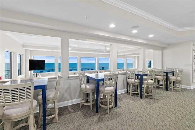3315 S Atlantic Ave Unit 1605, Daytona Beach Shores, FL 32118 - dining room featuring carpet, ornamental molding, recessed lighting, and plenty of natural light