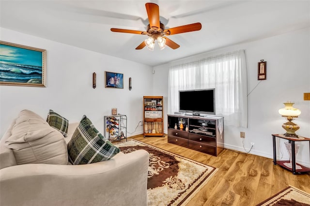 2468 Kimberly Dr, Deltona, FL 32738 - living room featuring light wood-style flooring and a ceiling fan