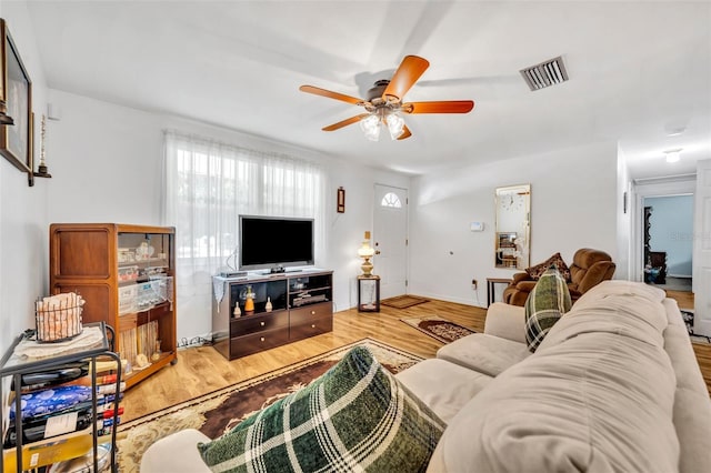 2468 Kimberly Dr, Deltona, FL 32738 - living area featuring a ceiling fan and wood finished floors