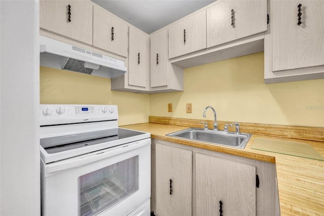 2468 Kimberly Dr, Deltona, FL 32738 - kitchen with white electric stove, under cabinet range hood, and light countertops