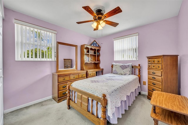 2468 Kimberly Dr, Deltona, FL 32738 - bedroom featuring light colored carpet and a ceiling fan