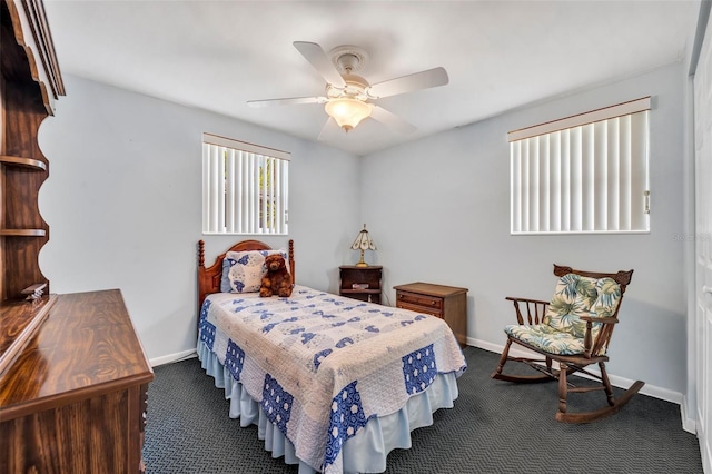 2468 Kimberly Dr, Deltona, FL 32738 - bedroom with dark colored carpet and a ceiling fan