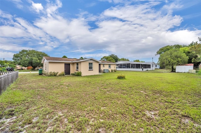2468 Kimberly Dr, Deltona, FL 32738 - view of yard with a sunroom