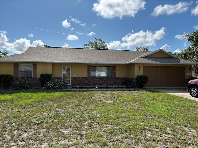 1887 Viking Ave, Deltona, FL 32725 - single story home featuring brick siding, an attached garage, and a front yard