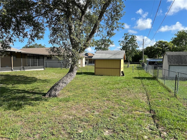 1887 Viking Ave, Deltona, FL 32725 - fenced backyard featuring a storage unit