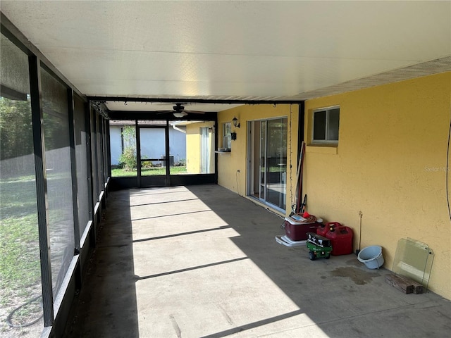 1887 Viking Ave, Deltona, FL 32725 - unfurnished sunroom with ceiling fan