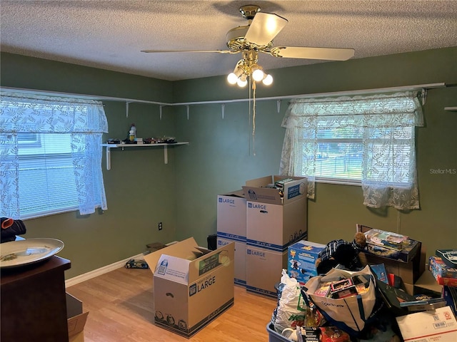 1887 Viking Ave, Deltona, FL 32725 - interior space featuring light wood-style flooring, a textured ceiling, and ceiling fan