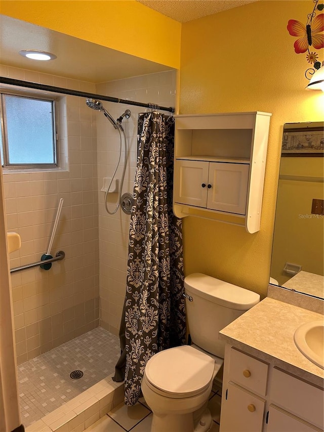 1887 Viking Ave, Deltona, FL 32725 - bathroom with vanity, a tile shower, and tile patterned flooring