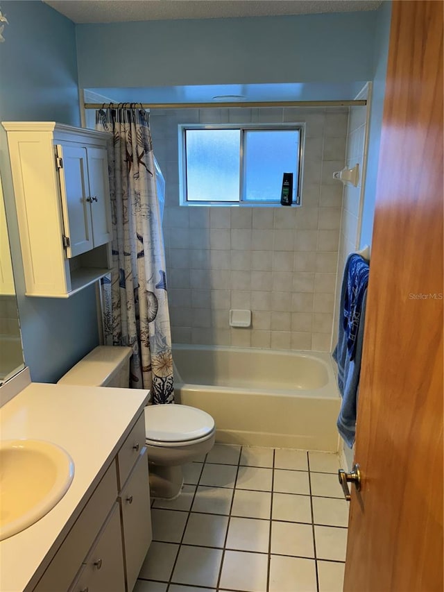 1887 Viking Ave, Deltona, FL 32725 - bathroom featuring tile patterned floors, shower / tub combo, and vanity