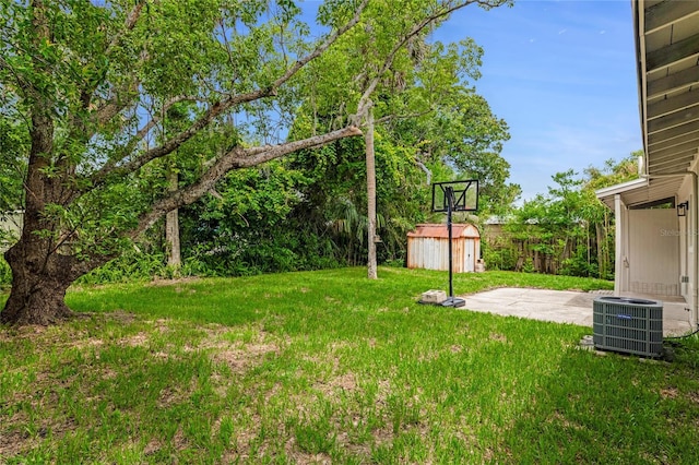 182 Grove St, Ormond Beach, FL 32174 - view of grassy yard with a shed and a patio