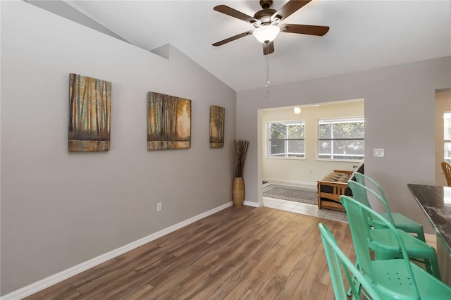 5 Bird Of Paradise Pl, Palm Coast, FL 32137 - living area featuring lofted ceiling, wood finished floors, and ceiling fan