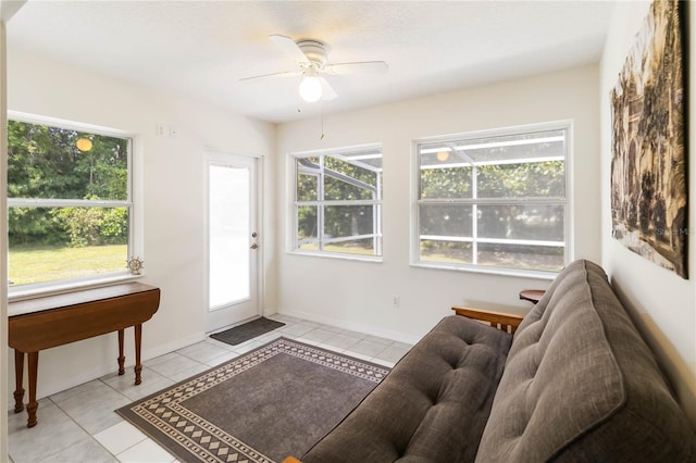 5 Bird Of Paradise Pl, Palm Coast, FL 32137 - living area featuring a ceiling fan and light tile patterned floors