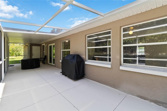 5 Bird Of Paradise Pl, Palm Coast, FL 32137 - view of patio / terrace featuring grilling area and glass enclosure