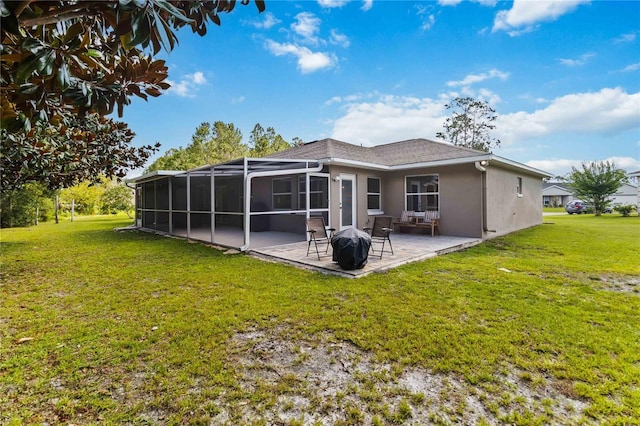 5 Bird Of Paradise Pl, Palm Coast, FL 32137 - back of house featuring a patio area, a yard, and stucco siding