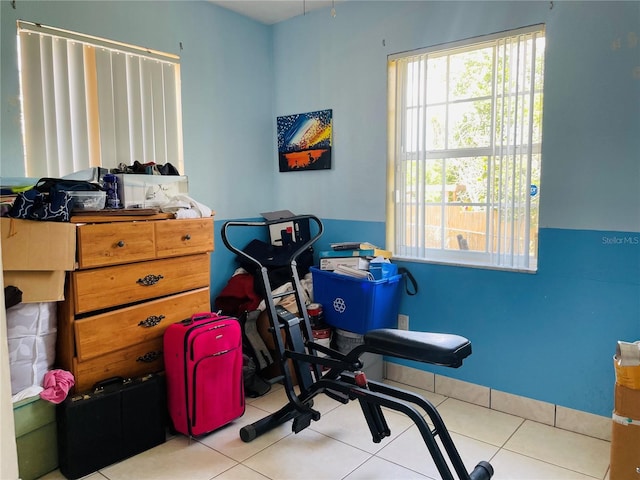 1025 Persian St, Deltona, FL 32725 - workout area featuring healthy amount of natural light and tile patterned flooring