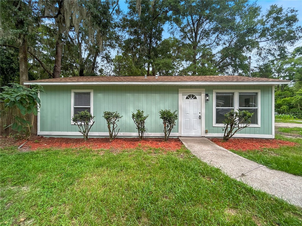 1960 NW 34th Ave, Gainesville, FL 32605 - view of front of property featuring a front yard