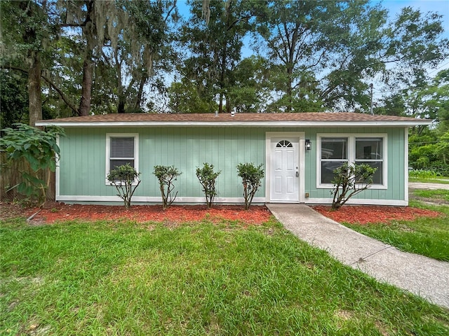 1960 NW 34th Ave, Gainesville, FL 32605 - view of front of property featuring a front yard