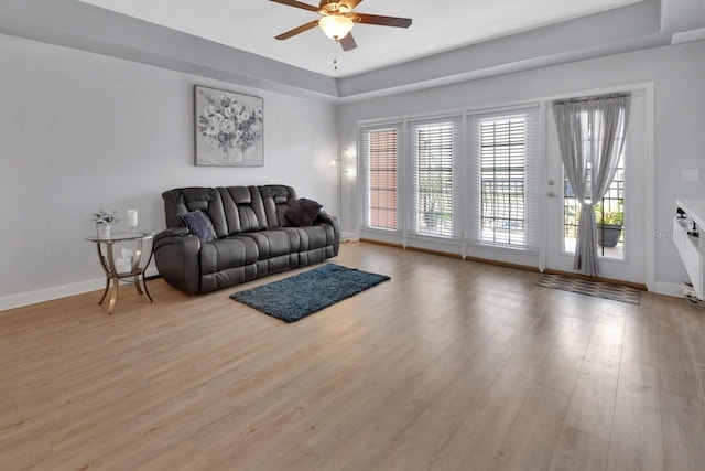 424 Luna Bella Ln Unit 330, New Smyrna Beach, FL 32168 - living room featuring ceiling fan and light wood-type flooring