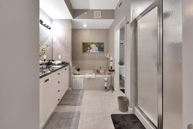 424 Luna Bella Ln Unit 330, New Smyrna Beach, FL 32168 - full bath with tile patterned floors, vanity, a bath, and a stall shower