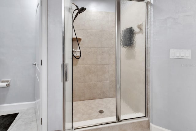 424 Luna Bella Ln Unit 330, New Smyrna Beach, FL 32168 - full bath featuring a shower stall and tile patterned flooring
