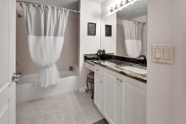 424 Luna Bella Ln Unit 330, New Smyrna Beach, FL 32168 - bathroom featuring shower / bath combination with curtain, vanity, and tile patterned flooring