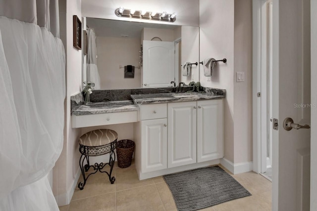 424 Luna Bella Ln Unit 330, New Smyrna Beach, FL 32168 - full bathroom featuring vanity and tile patterned floors