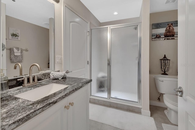 424 Luna Bella Ln Unit 330, New Smyrna Beach, FL 32168 - full bathroom featuring vanity, a shower stall, and tile patterned floors