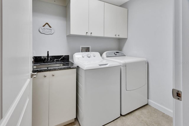 424 Luna Bella Ln Unit 330, New Smyrna Beach, FL 32168 - laundry area featuring cabinet space and independent washer and dryer