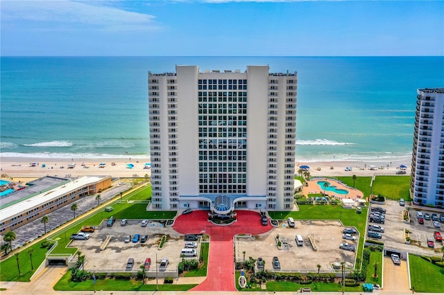 2545 S Atlantic Ave Unit 102, Daytona Beach Shores, FL 32118 - aerial view of waterfront with a beach and apartment complex