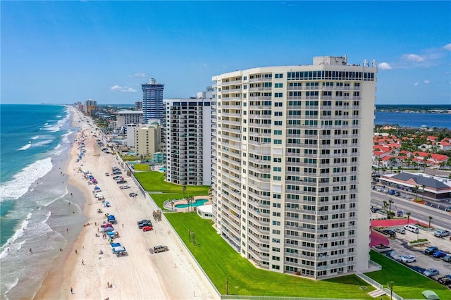 2545 S Atlantic Ave Unit 102, Daytona Beach Shores, FL 32118 - drone / aerial view of waterfront with a beach and apartment complex