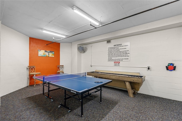 2545 S Atlantic Ave Unit 102, Daytona Beach Shores, FL 32118 - game room featuring carpet floors and concrete block wall