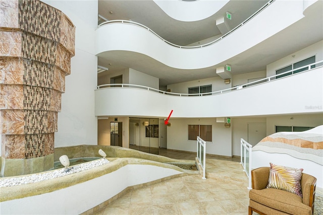 2545 S Atlantic Ave Unit 102, Daytona Beach Shores, FL 32118 - building lobby with a high ceiling
