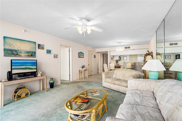 2545 S Atlantic Ave Unit 102, Daytona Beach Shores, FL 32118 - living area with carpet floors and ceiling fan