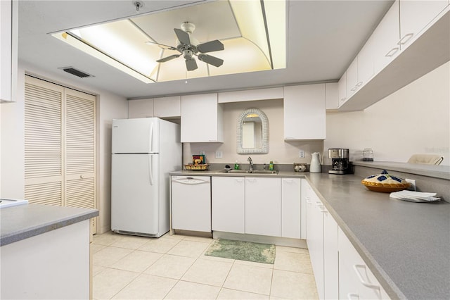 2545 S Atlantic Ave Unit 102, Daytona Beach Shores, FL 32118 - kitchen featuring white appliances, a ceiling fan, white cabinetry, and light tile patterned floors