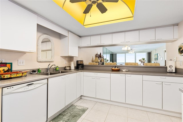 2545 S Atlantic Ave Unit 102, Daytona Beach Shores, FL 32118 - kitchen with white dishwasher, white cabinetry, a ceiling fan, light tile patterned flooring, and a raised ceiling