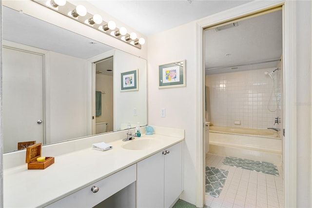 2545 S Atlantic Ave Unit 102, Daytona Beach Shores, FL 32118 - full bathroom featuring tile patterned flooring, vanity, and shower / bath combination