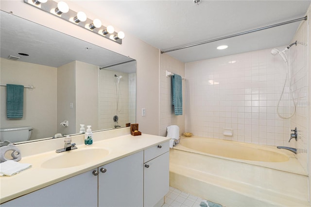 2545 S Atlantic Ave Unit 102, Daytona Beach Shores, FL 32118 - bathroom with vanity, tile patterned flooring, tub / shower combination, and recessed lighting