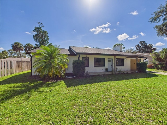 2526 Victory Palm Dr, Edgewater, FL 32141 - rear view of house featuring a chimney